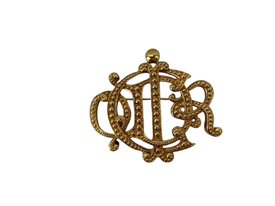 Dior ロゴ ブローチ